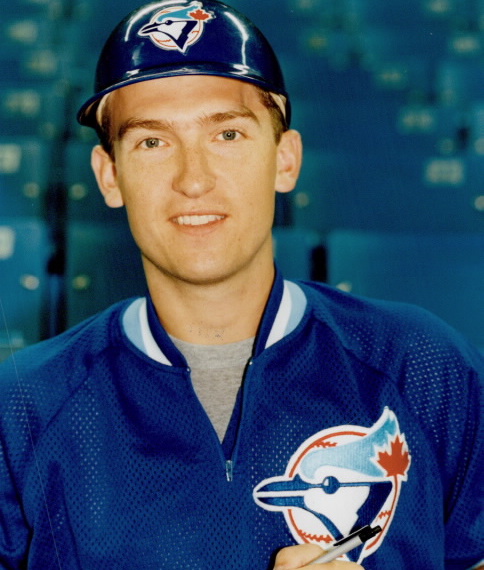 Portrait of New York Mets infielders Rey Ordonez, John Olerud